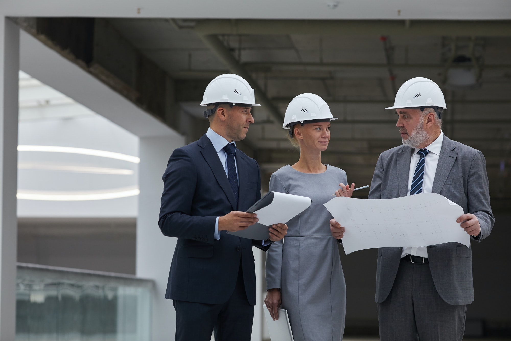 Management Discussing Construction on Site